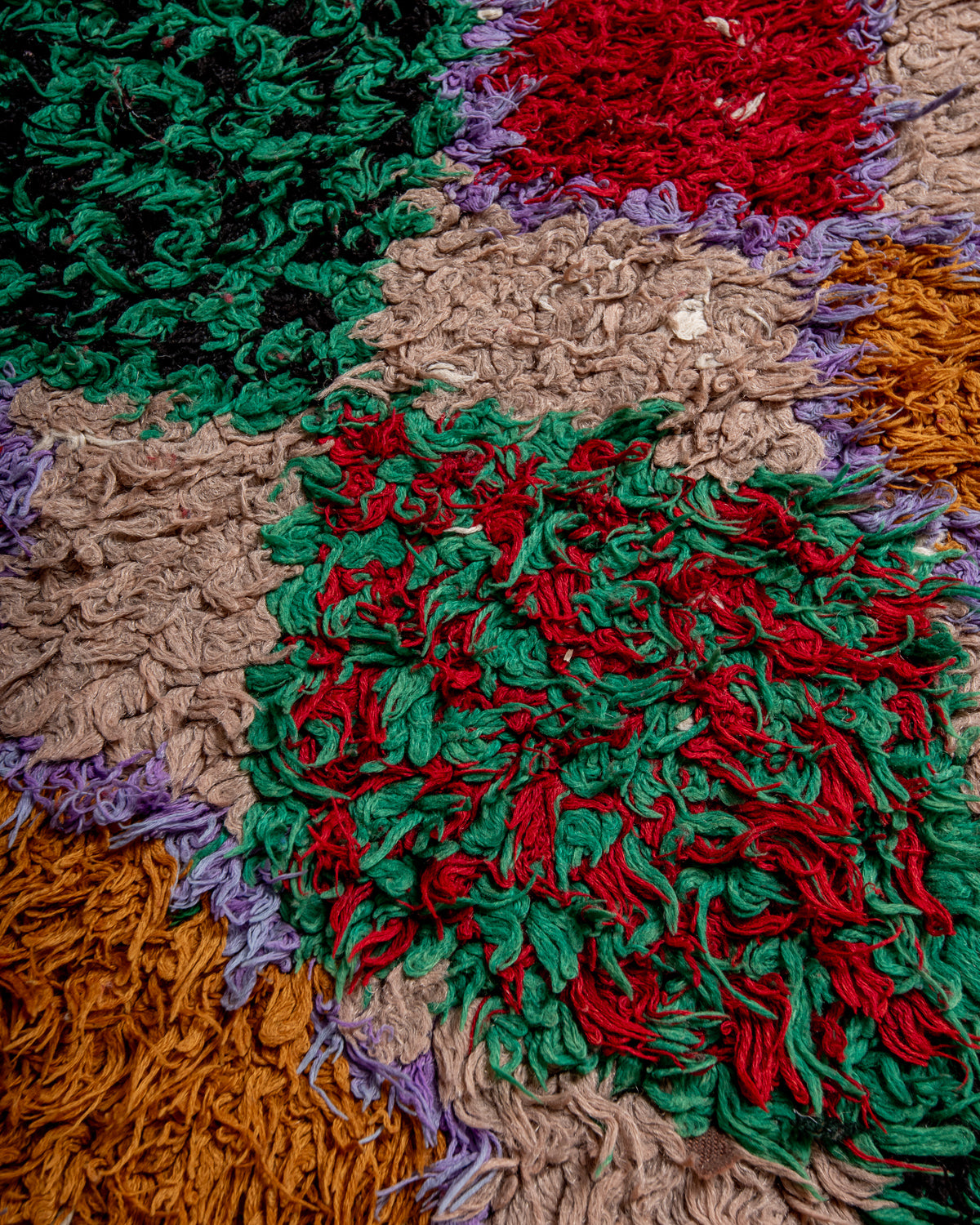 Modern designer vintage handcrafted Berber rug from Morocco. Boucherouite runner rug with beautiful colors and patterns.